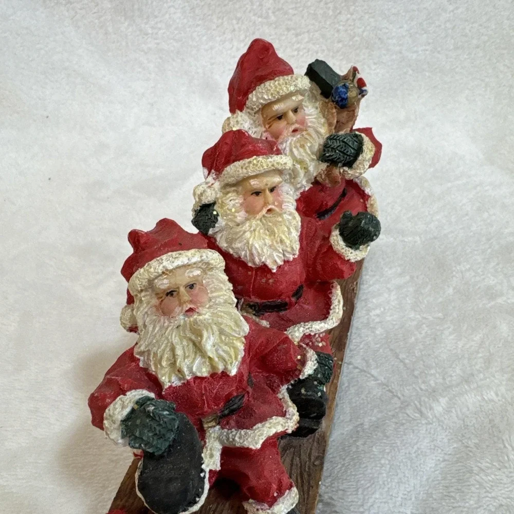 Three Jolly Santas Riding On a Sled‎ Christmas Figurine Vintage 90s